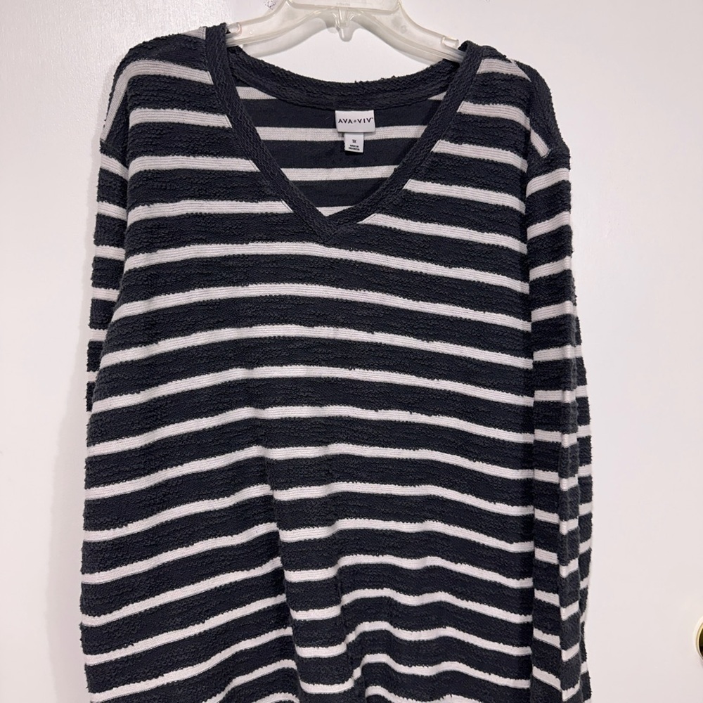 Woman’s long sleeve, V-neck shirt